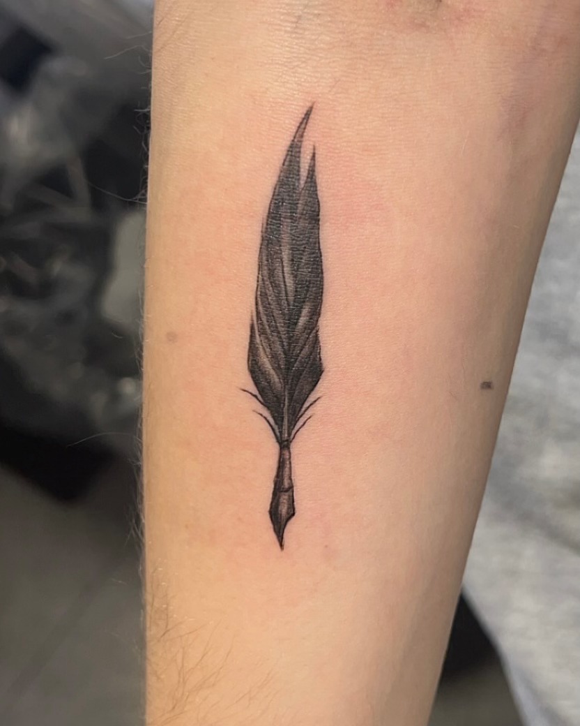 Fine line quill tattoo by Mathusha